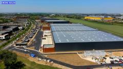 Photo par drone de suivi de chantier de bâtiments industriels en Normandie
